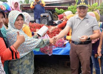 Pj Bupati, Henrizal Gelar Operasi Pasar Pangan./ doc.ist