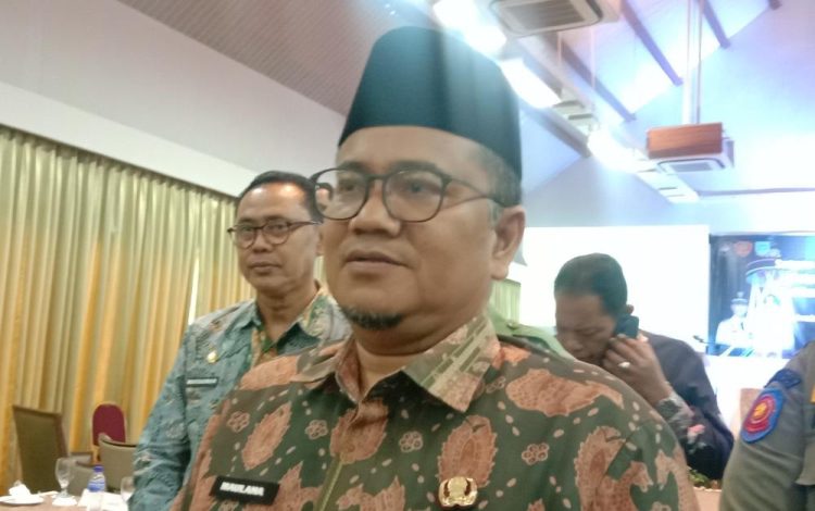 Wakil Walikota Jambi, Maulana, saat Acara Pengukuhan Satgas Linmas, Kamis (22/12). Foto: Meli/Ampar.id