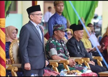 Plt Staf Ahli Bidang Keuangan Muhammad Ali bertindak sebagai pembina upacara HAB ke 77/ (Foto: Nuaria/Ampar)