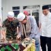 Anwar Sadat menandatangani prasasti peresmian Masjid As-Syarif Kodim 0419/Tanjab, Jumat (27/1). Foto: Wahyu