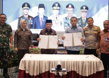 Pemprov Jambi dan Bawaslu Teken NPHD Pilgub Jambi Rp 61,1 Miliar/ Foto; Alan