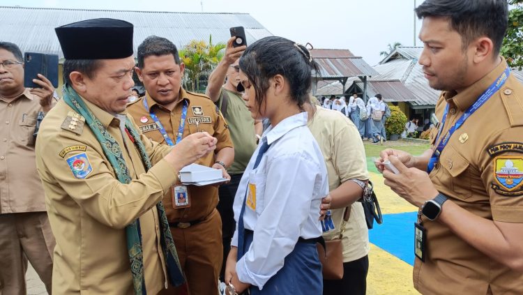 Ratusan Siswa SMA/SMK dan SLB di Batanghari Terima Bantuan Pendidikan Program Dumisake/ (Foto: Riky)