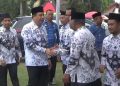 Pj Bupati Merangin Pimpin HUT PGRI ke-78 dan HGN di Pamenang/ Foto: Teguh