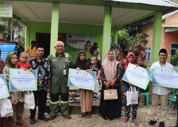 Salurkan Bantuan Susu untuk BALITA, PetroChina Konsisten Bantu PEMDA Percepat Penurunan Stunting di Tanjab Barat/ (foto: Melani)