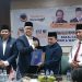 Al Haris dan Abdullah Sani mengembalikan formulir pendaftaran Penjaringan Bacagu Jambi ke DPW Nasdem Provinsi Jambi, Selasa (7/5/2024)