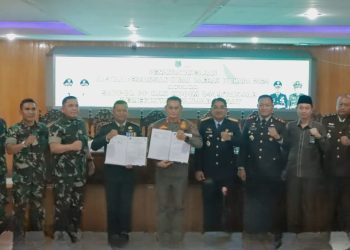 Pemkab Tanjab Barat Teken NPHD untuk Pengamanan Pilkada Serentak 2024
