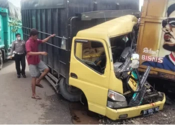 Ilustrasi laka truk batubara di Jmabi