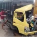Ilustrasi laka truk batubara di Jmabi